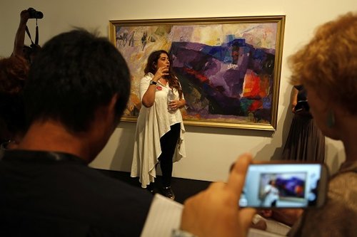 Museum spokesperson Reem Fadda speaks to journalists during a media tour ahead of the "Jerusalem Lives" exhibition at the Palestinian Museum / AFP PHOTO / ABBAS MOMANIThe exhibition is scheduled to open on August 27 until December 15. / AFP PHOTO / ABBAS MOMANI